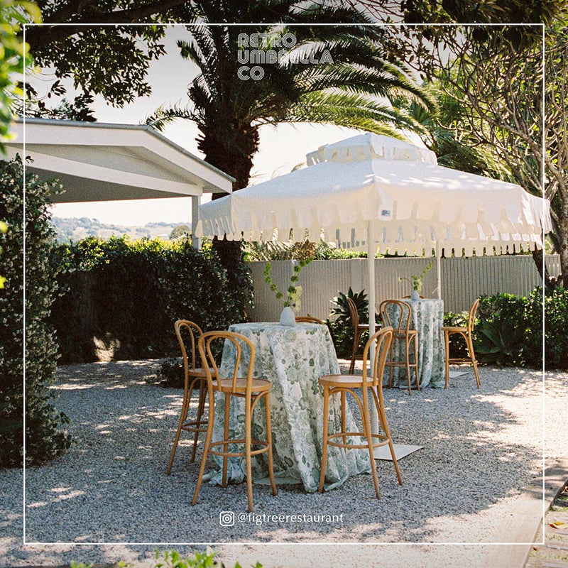 UGC of Double Tiered Ivory Mist Market Umbrella