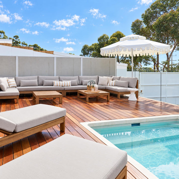 Ivory Mist umbrella by Retro Umbrella Co on Courtney & Sev's pool terrace, The Block 2026
