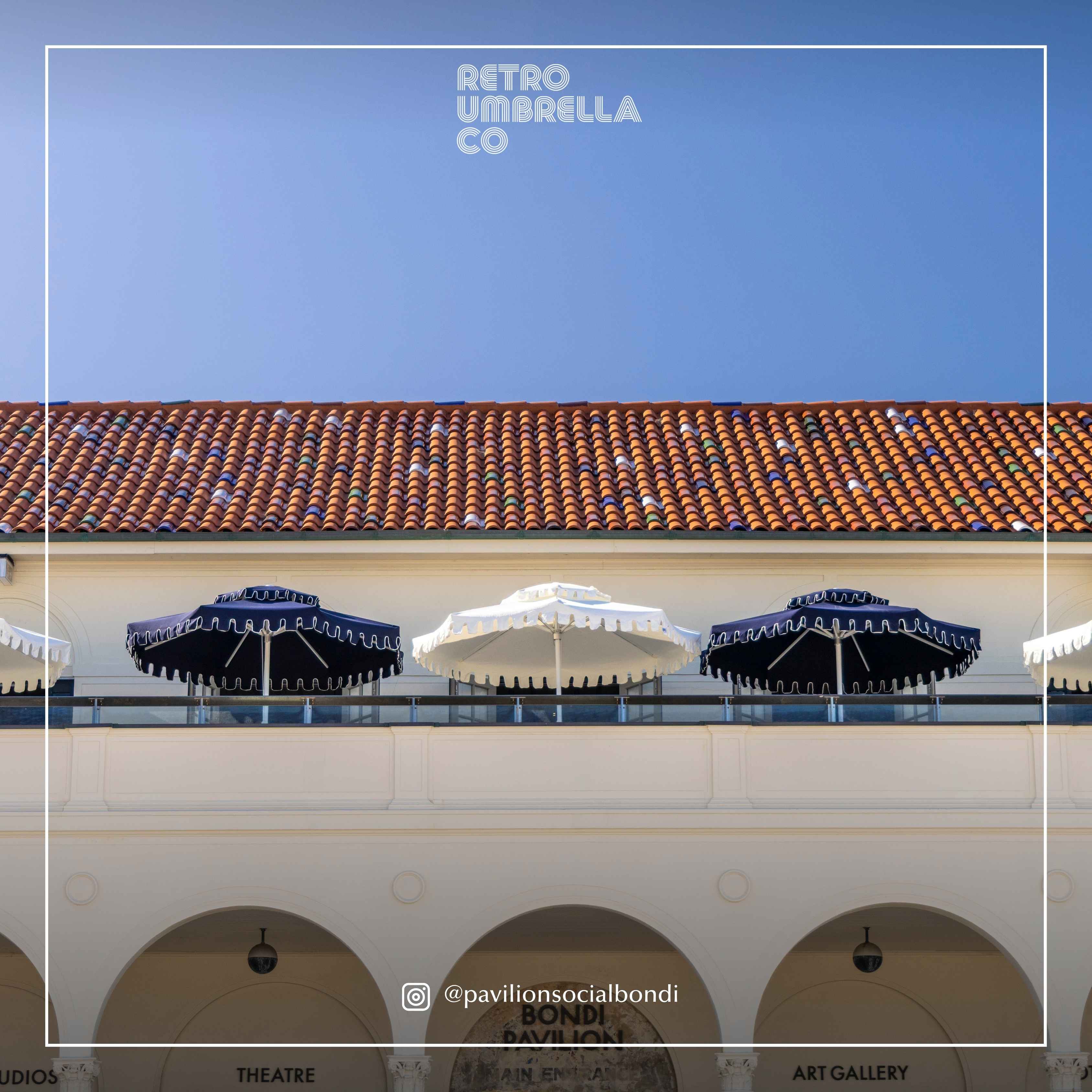 UGC of Double Tiered Ivory Mist Market Umbrella