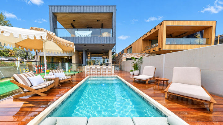 Adam & Jolene's pool on The Block 2026 with a Desert Sand umbrella by Retro Umbrella Co