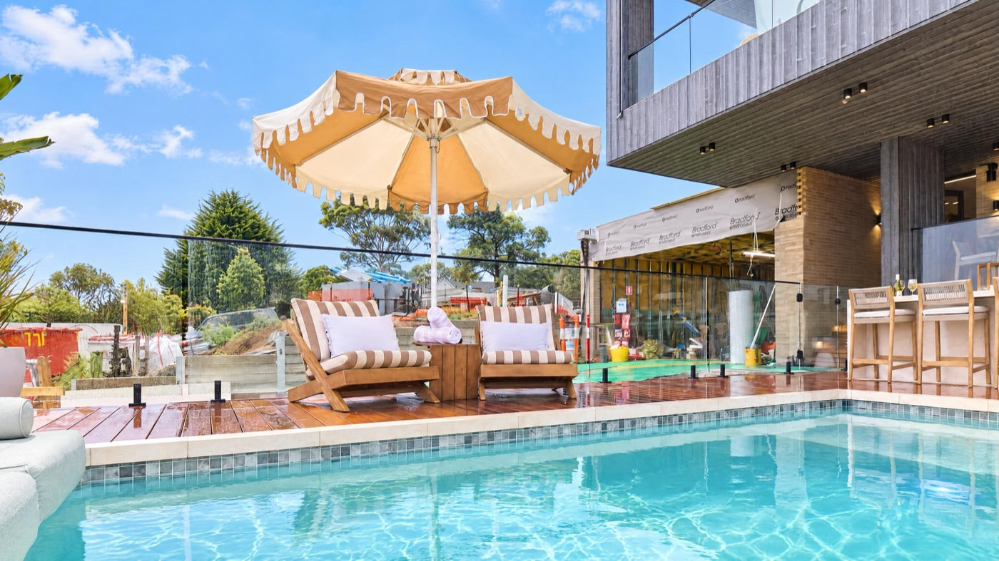 Desert Sand double-tier umbrella by Retro Umbrella Co at Adam & Jolene's pool, Pool & Terrace Week winner on The Block 2026