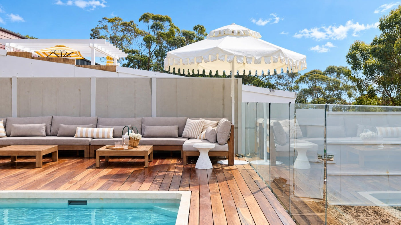 Ivory Mist double-tier umbrella by Retro Umbrella Co on Courtney & Sev's pool terrace, The Block 2026