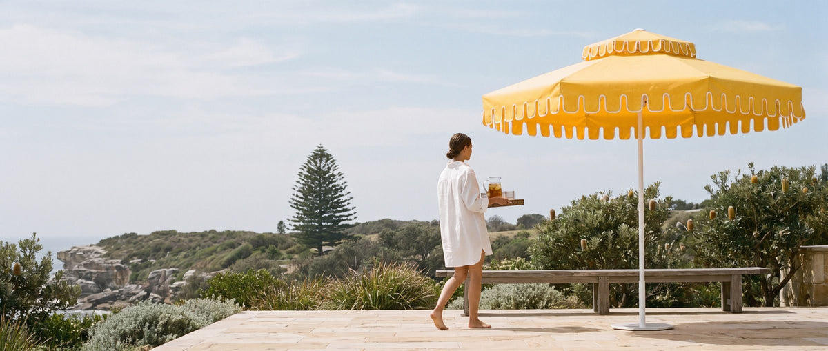 A Golden Hour umbrella by a pool